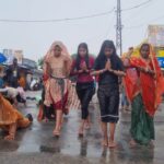 A flood of faith is surging in the trunk of Shri Kalyan Ji Maharaj, neither afraid of the rain nor worried about the blisters on his feet.